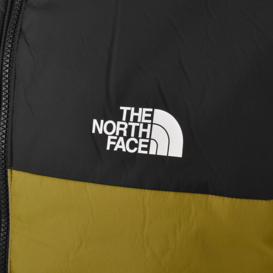The north face black and yellow jacket store